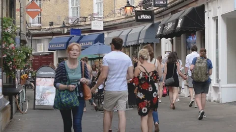 Rose Crescent restaurants with diners and view of shops, Cambridge, UK Stock Footage 92846145