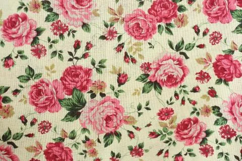 Rose design seamless pattern on fabric background Stock Photos