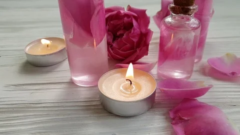Rose extract, candle, slow motion Video stock 96094726