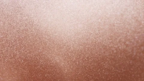 Rose gold glitter sparkling gently, spreading luxurious shimmer Video stock 343938638