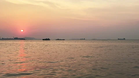 Rose gold sunset reflection on sea waves Stock Footage 238730852