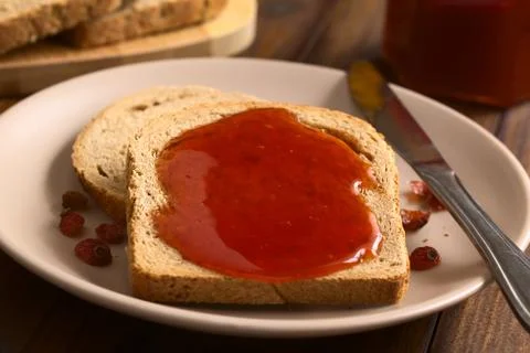 Rose Hip Jam on Bread Stock Photos