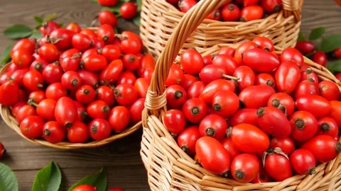 Rose hips in baskets on the table. Stock Footage 328441169