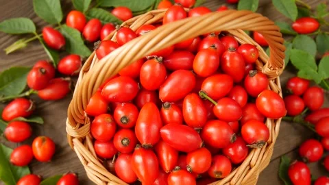 Rose hips in baskets on the table. Stock Footage 328592169