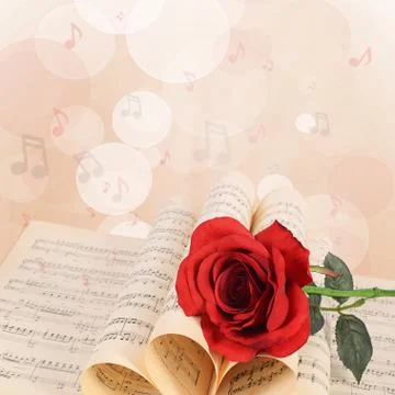 The rose on notebooks with notes Illustrazione stock