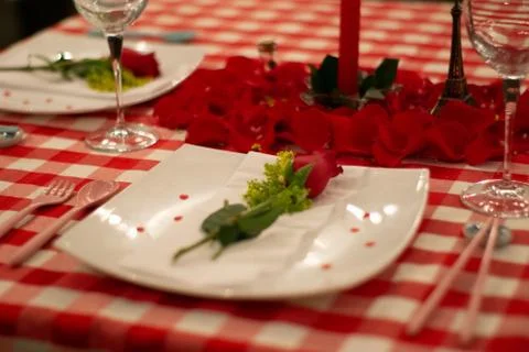 Rose on plate on table Stock Photos