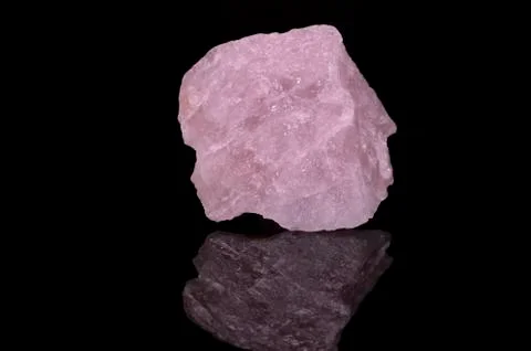 Rose Quartz on black background Stock Photos