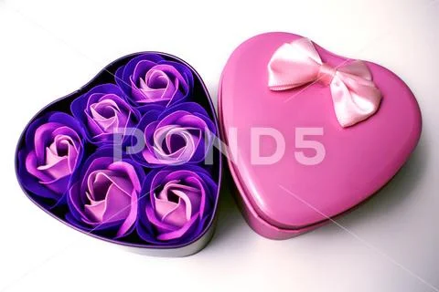 Rose soap flower gift box. Scented bath soap rose flower petals. Stock Photos