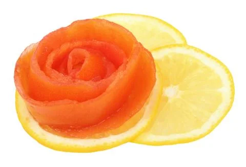Rose of tomato on a slice of lemon Stock Photos