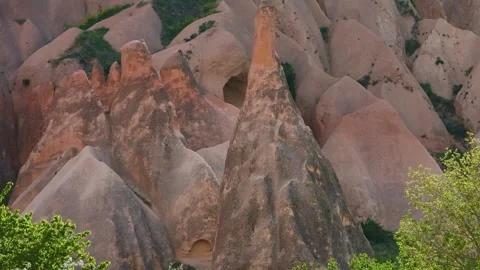 Rose Valley in Cappadocia, Turkey, featuring unique "fairy chimney" rock formati Stock Footage 332545275