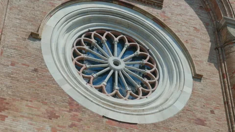 Rose window gothic cathedral facade handheld pan shot Stock Footage 342650142