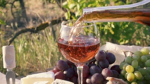 Rose wine can be poured into a glass Stock Footage 90708575