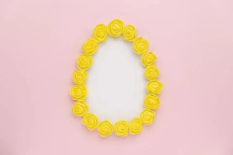 Rosebuds egg shape on pink background Stock Photos