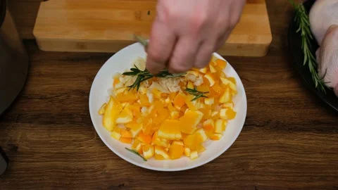Rosemary added to fruit Video stock 190325123