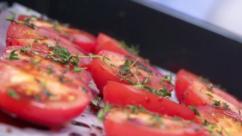 Rosemary is falling on tomatoes. Stock Footage 136878592