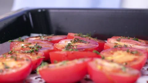 Rosemary is falling on tomatoes. Stock Footage 136878594