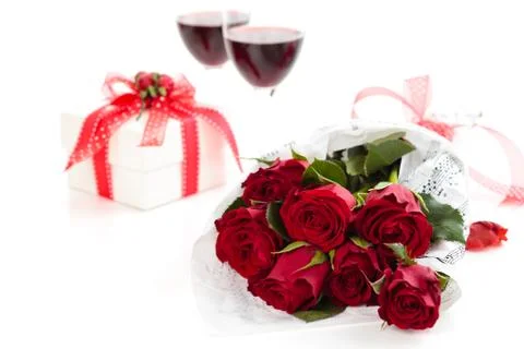 Roses and gift. Stock Photos