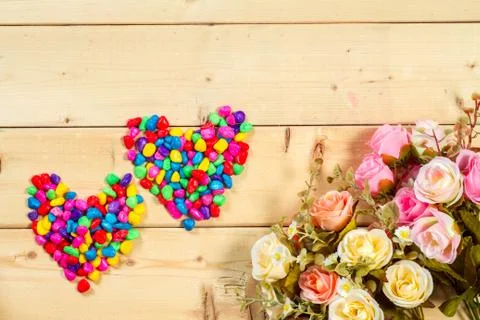 Roses flowers and empty space on wooden background Stock-Fotos