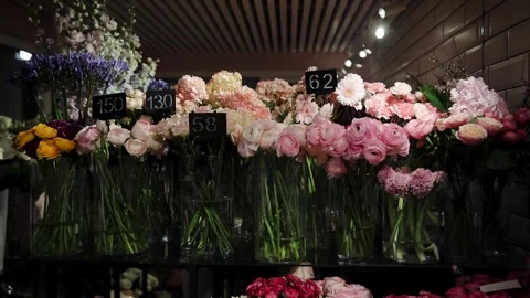 Roses, hydrangeas, chrysanthemums and other flowers in refrigerator room in a Stock Footage 273919301