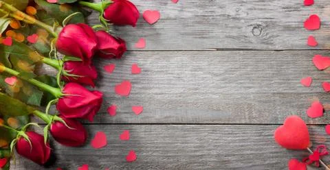 Roses on the old table Stock Photos
