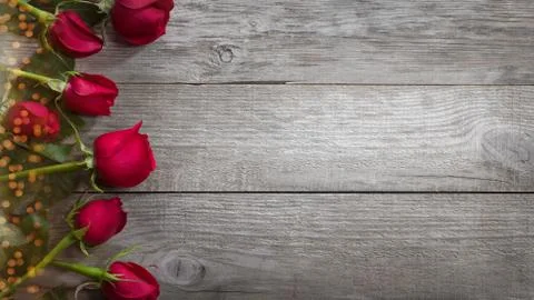 Roses on the old table Stock Photos