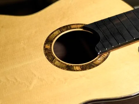 Rosette on the body of a classical guitar close-up. Stock Photos