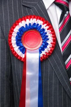 Rosette on suit close up. Stock Photos
