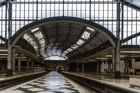 Rossio train station in Lisbon. Inside of the building with platform and train Stock Photos