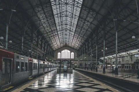 Rossio train station in Lisbon. Inside of the building with platform and train Stock Photos