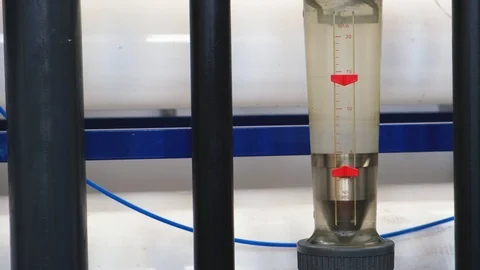 Rotameter, measures volumetric flow rate of water in tube, water filtration Video stock 126998030