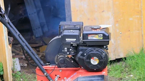 Rotary cultivator engine powered on Stock Footage 87479384