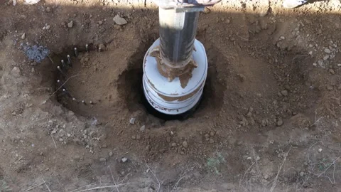 Rotary drilling rig machine auger gets into hole Video stock 224682656