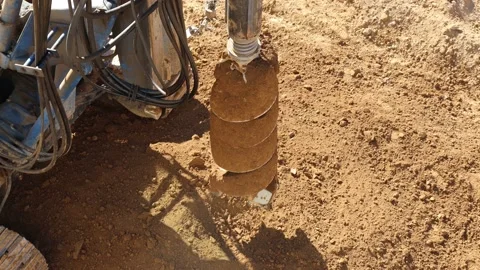 Rotary drilling rig machine dumps the soil Video stock 224683822