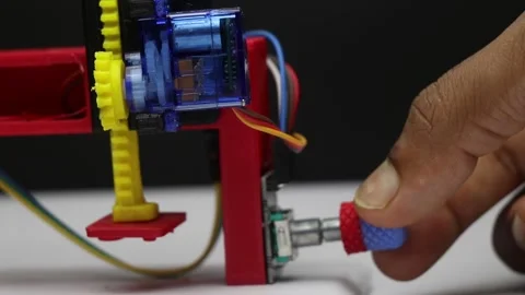 Rotary encoder controlling servo motor with 3d printed gears Stock Footage 344782105