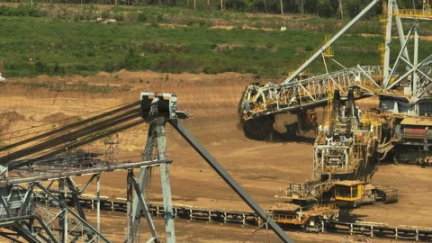 Rotary excavator digging soil Stock Footage 212633943