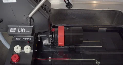 Rotary Film Processing using a Professional JOBO CPE3 Processor in a Darkroom. Stock Footage 315945629