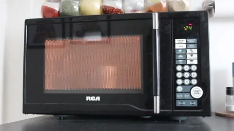Rotary Microwave Heating Up Stock Footage 237722472