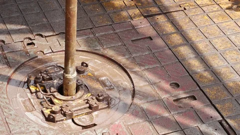 Rotary table while drilling oil well and pipe being rotated and a slip Stock Footage 71099439