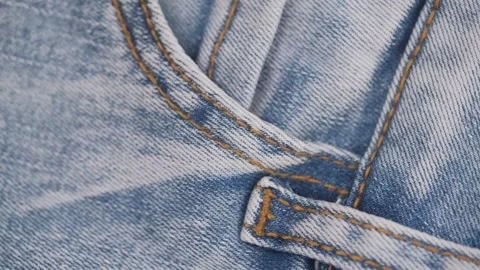 Rotate of details and elements of jeans in closeup. macro video. selective focus Stock Footage 240417550