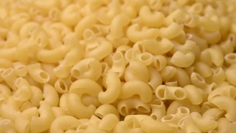 Rotate Dried Raw Macaroni Pasta Food Texture Close Up Front View Stock Footage 325985909