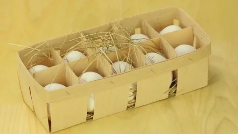 Rotate eggs in a box Stock Footage 180639445