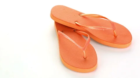 Rotate flip-flops on a white background Stock Footage 50960240