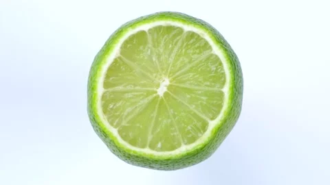 Rotate half lime isolated on white background Stock Footage 196124700