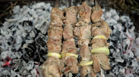 Rotate the meat on the fire Stock Footage 50491345