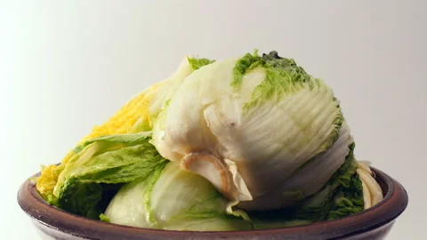 Rotate salt pickled cabbage for kimchi on crock 库存影片 162632944