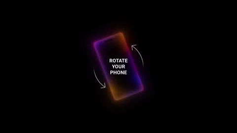 Rotate your phone for full-screen viewing. Dark background with a glowing phone Vídeos de archivo 277443904