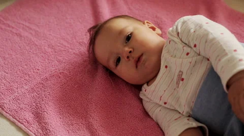  Rotates BAby face nice looking camera Stock Footage 59776538