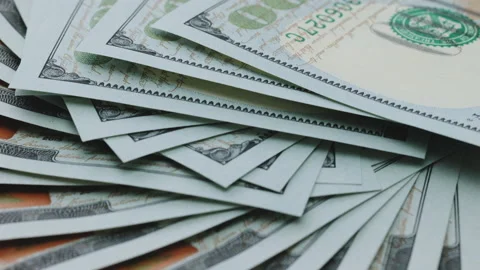 Rotating 100 USA dollars banknotes. Closeup new american one hundred dollar Stock Footage 194649012