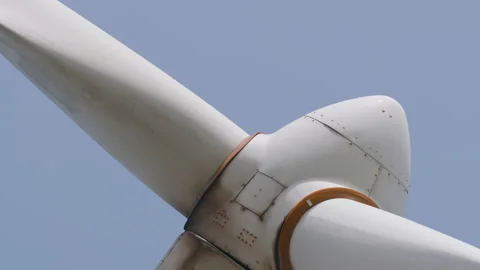 Rotating 3 blade horizontal-axis wind turbine HAWT, close up 1. 4K locked tripod Stock Footage 149638700