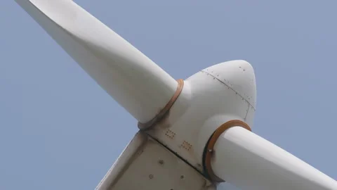 Rotating 3 blade horizontal-axis wind turbine HAWT, close up 2. 4K locked tripod Stock Footage 149640269